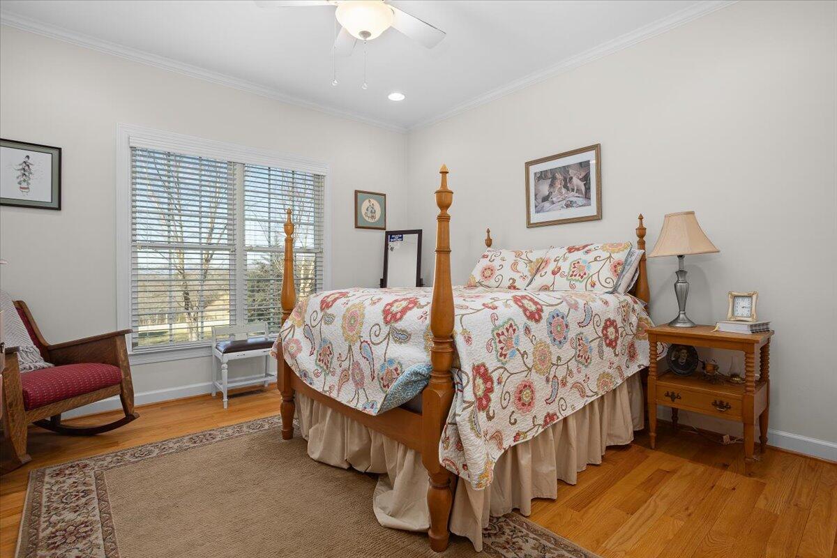 360 Maple Ridge Lane Fincastle, VA 24090 - Photo 27 of 77 a bed room with a bed and a chair
