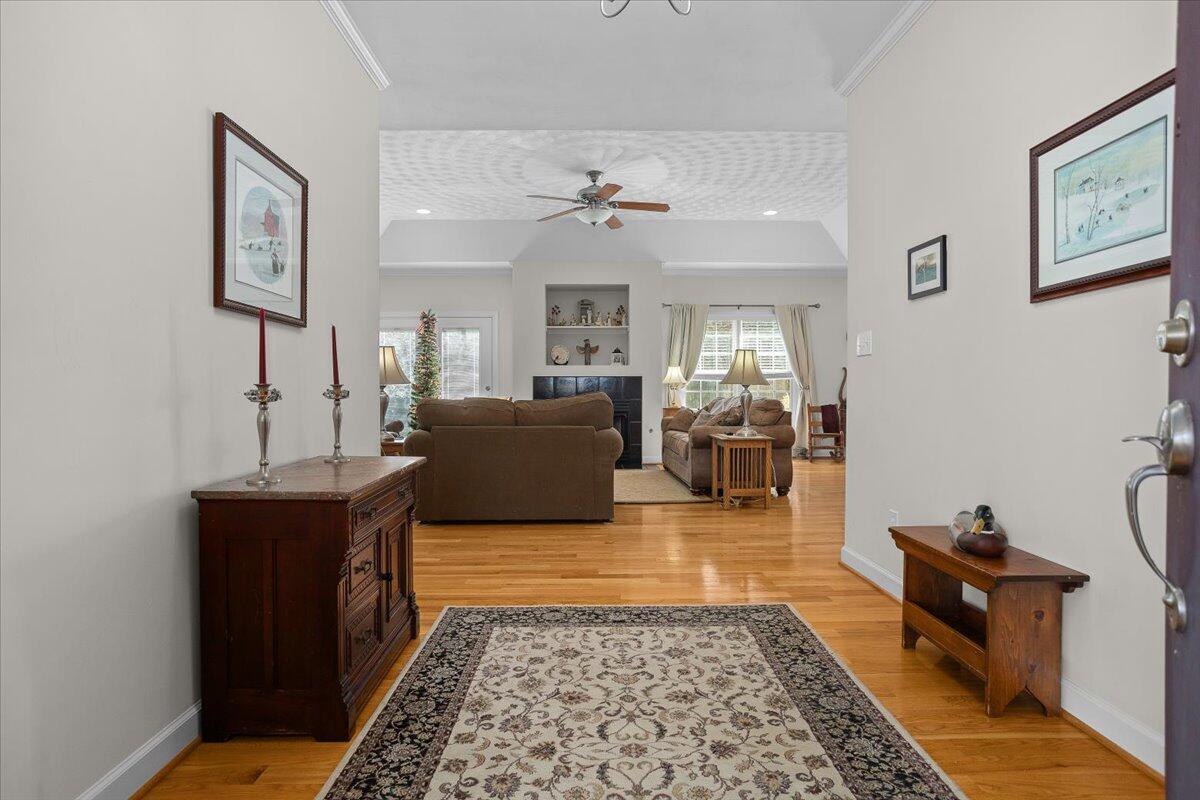 360 Maple Ridge Lane Fincastle, VA 24090 - Photo 5 of 77 a living room with furniture and wooden floor