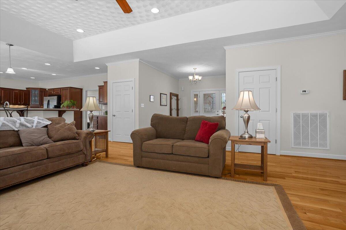 360 Maple Ridge Lane Fincastle, VA 24090 - Photo 9 of 77 a living room with furniture and a wooden floor