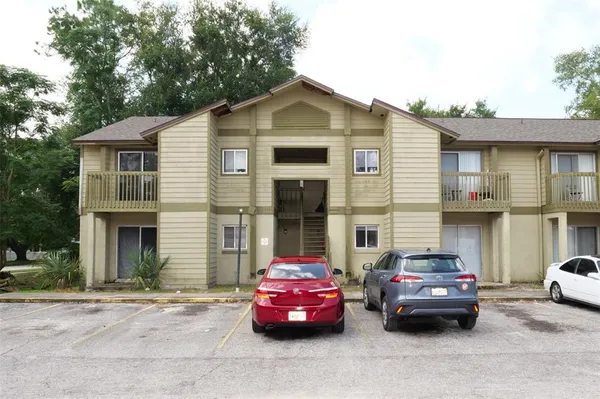 a car parked in front of a house
