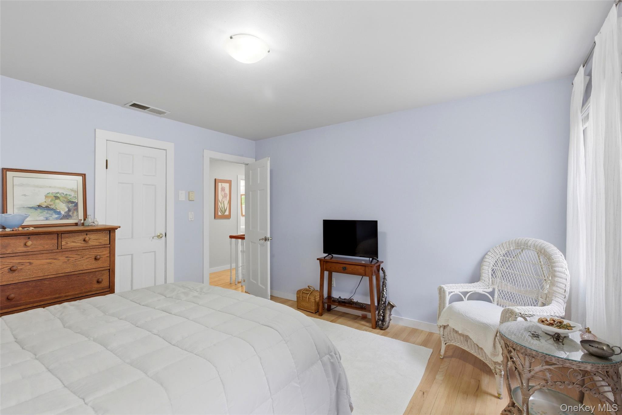 7 Gun Path Setauket, NY 11733 - Photo 24 of 34 a bedroom with a bed and furniture