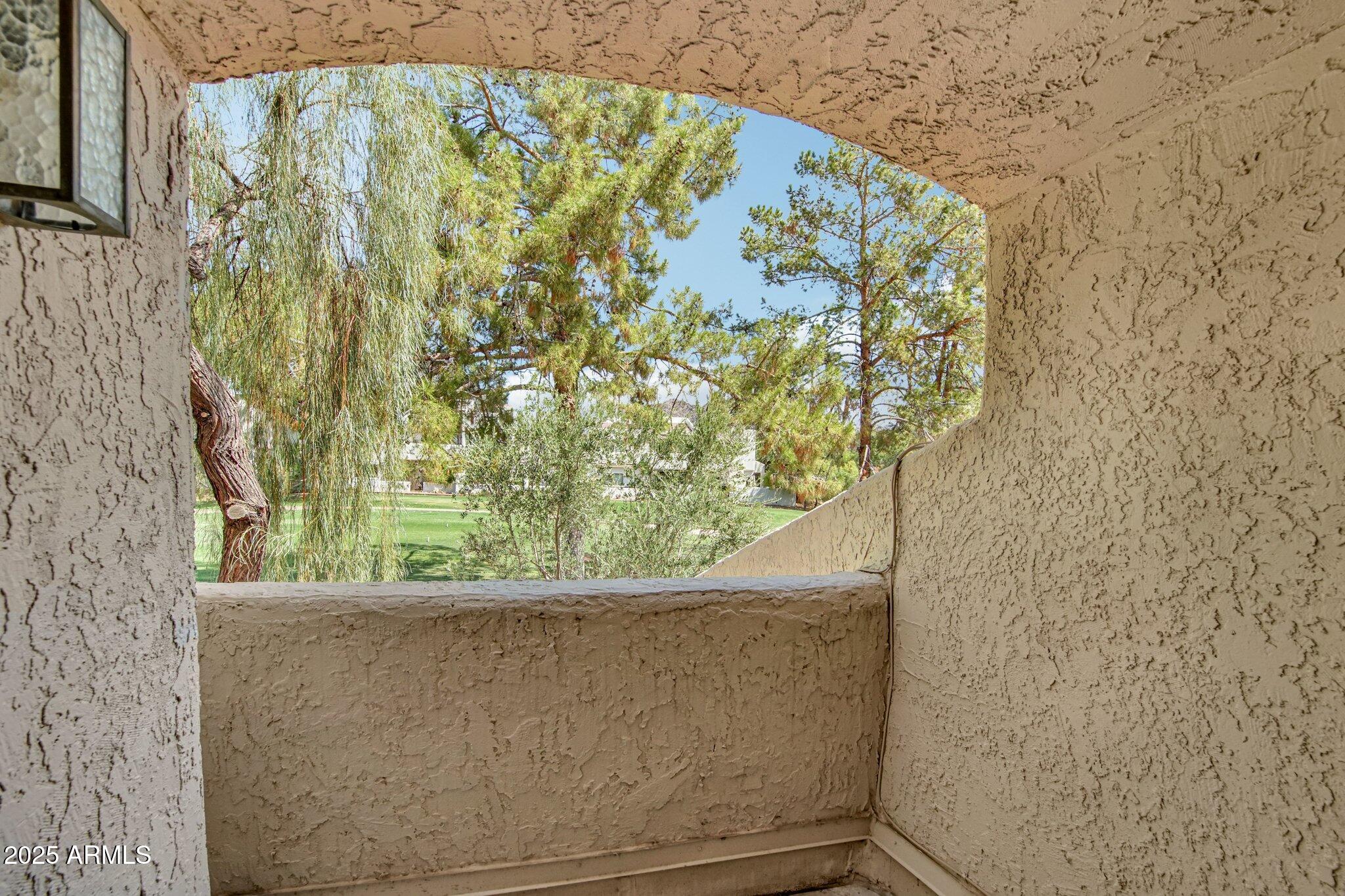 2626 East Arizona Biltmore Circle, Unit 14 Phoenix, AZ 85016 - Photo 34 of 52 Balcony off 2nd Bedroom Upstairs