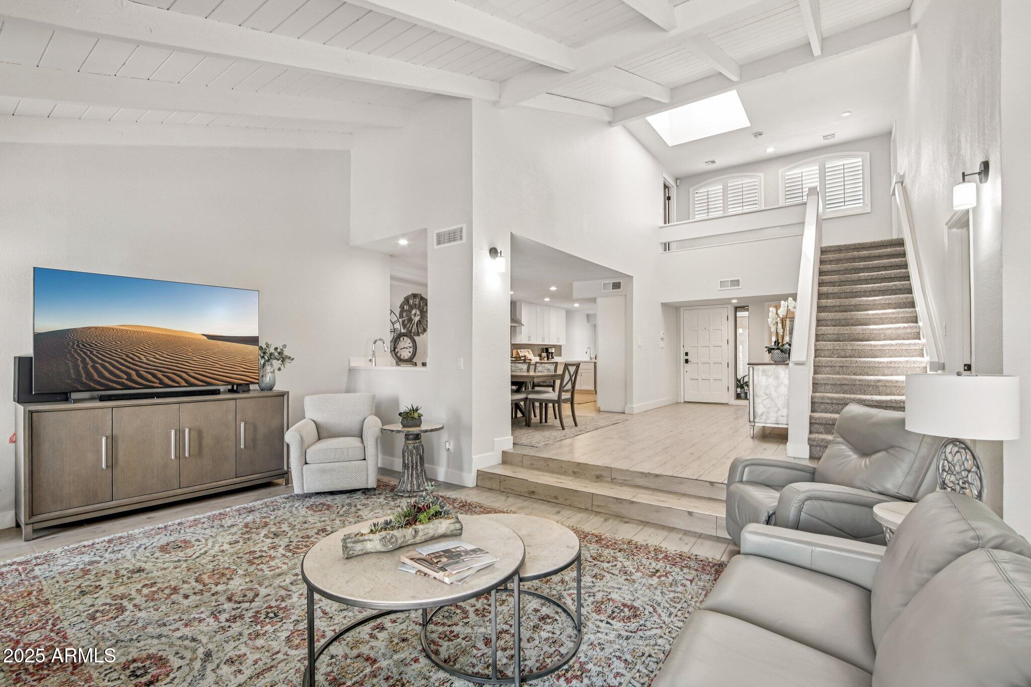 2626 East Arizona Biltmore Circle, Unit 14 Phoenix, AZ 85016 - Photo 5 of 52 Family room with Vaulted Ceilings