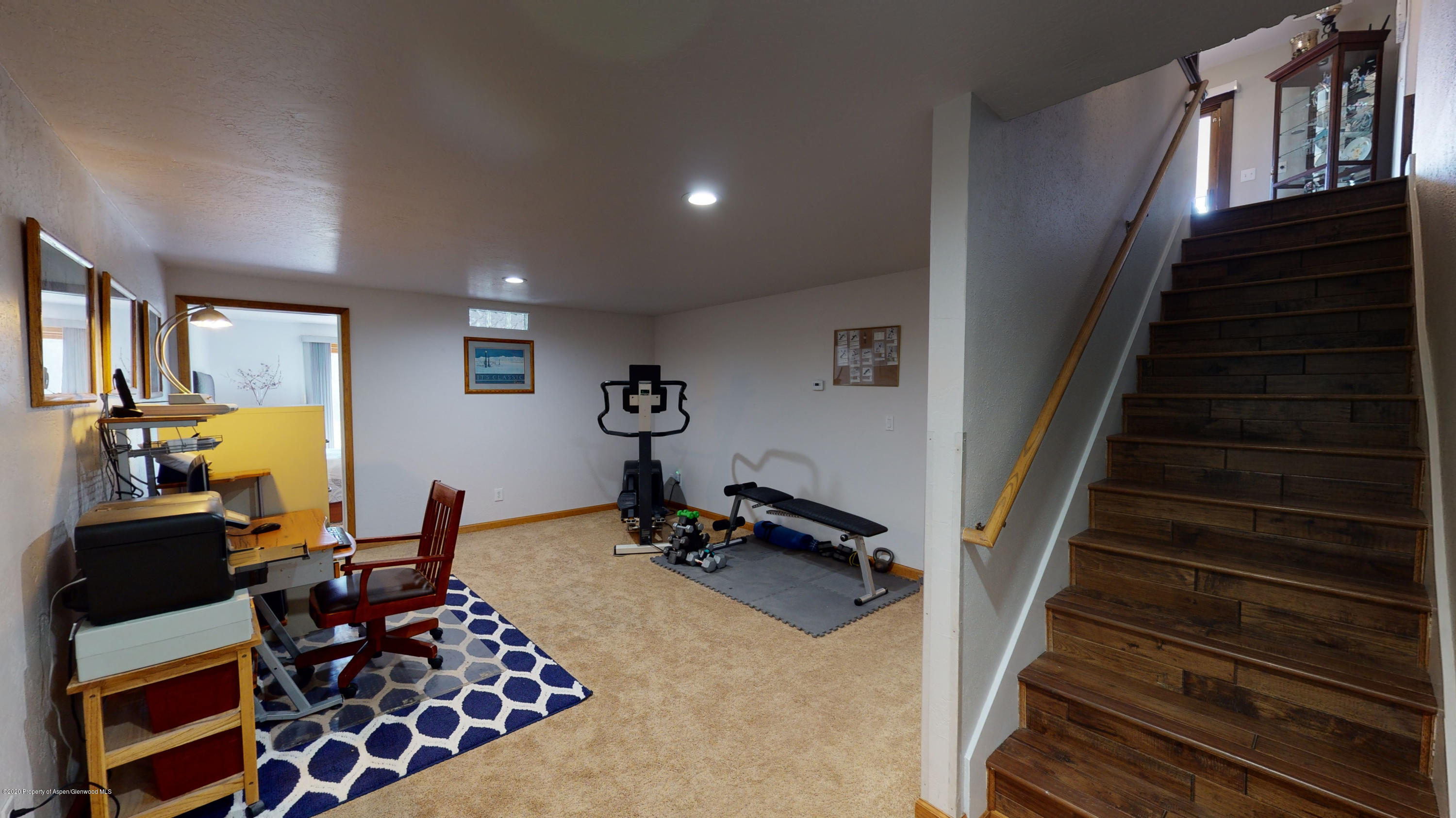 4140 County Road 320 Rifle, CO 81650 - Photo 38 of 53 bonus room with staircase