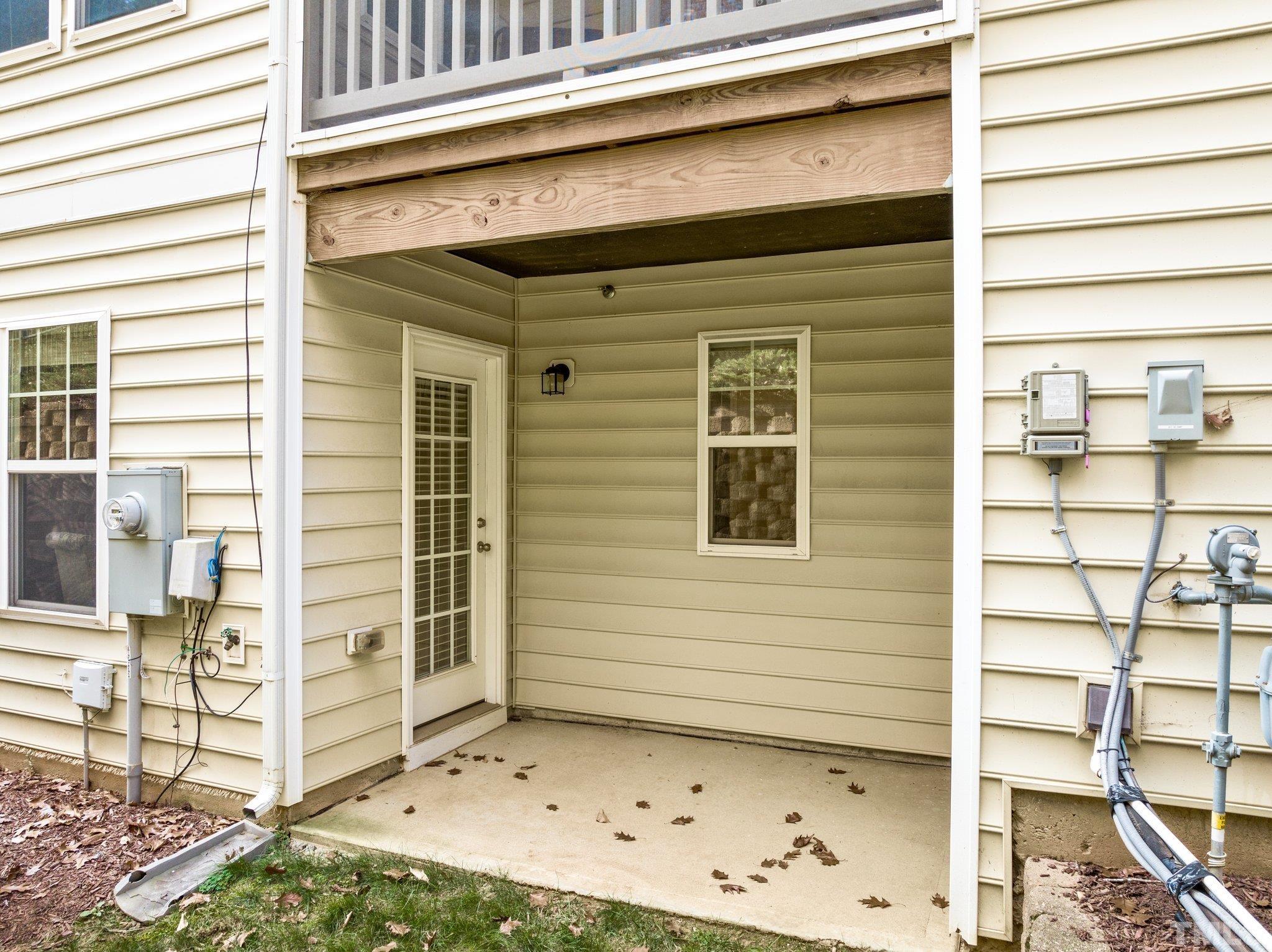 6104 Braidwood Court Raleigh, NC 27612 - Photo 29 of 31 a view of a door of the house