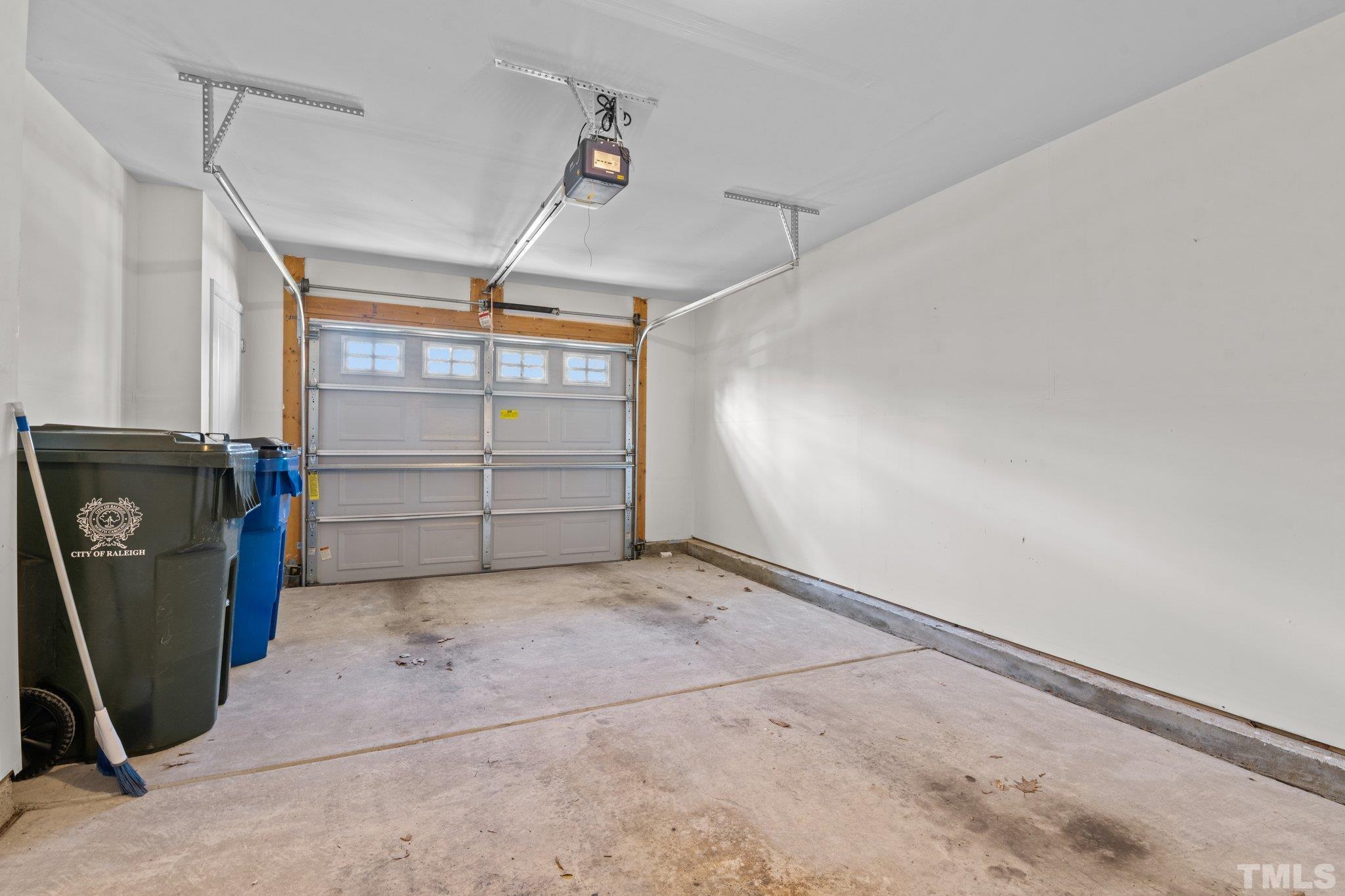 6104 Braidwood Court Raleigh, NC 27612 - Photo 30 of 31 a view of a garage