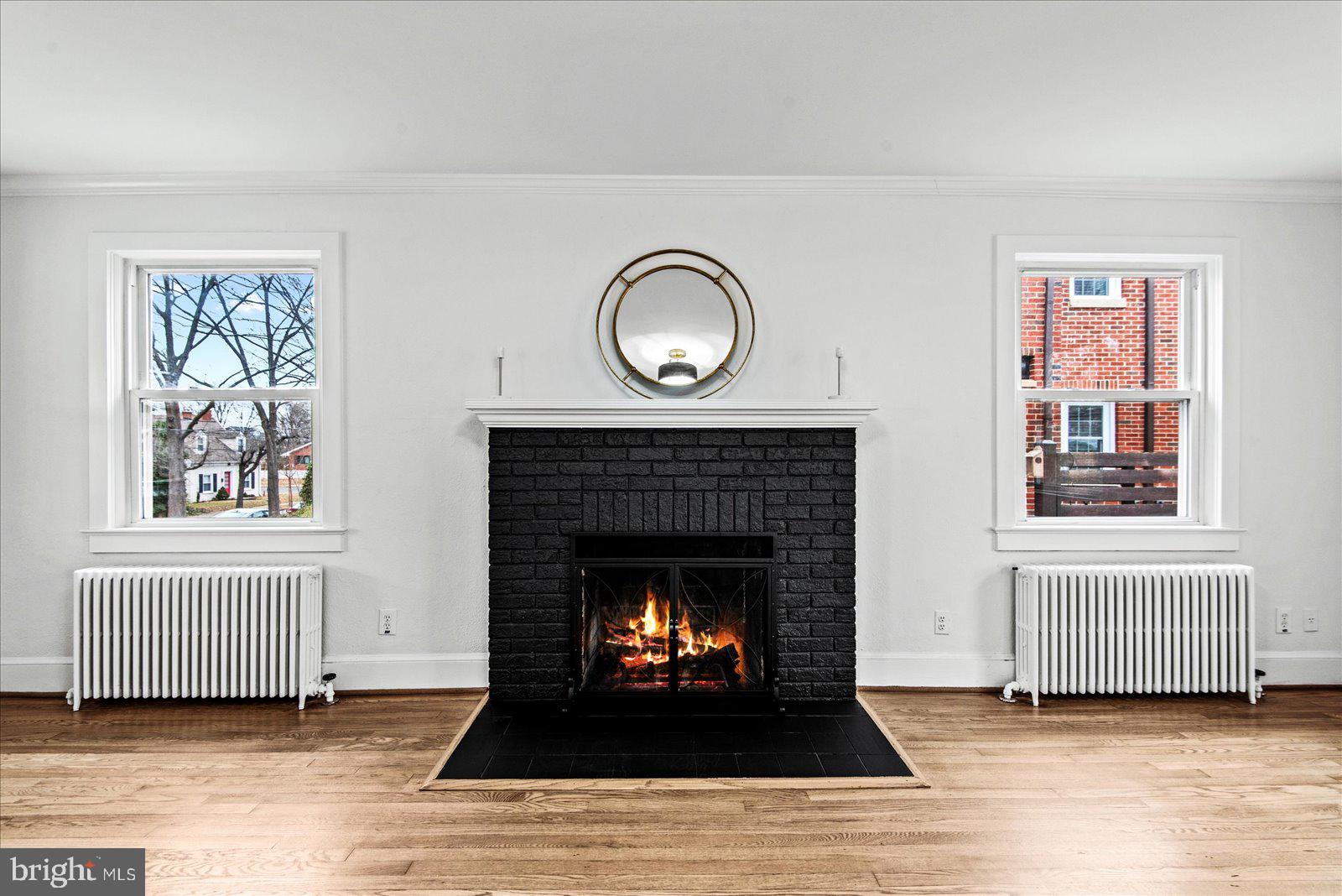 1312 Rowe Street Fredericksburg, VA 22401 - Photo 11 of 45 a living room with furniture and a fireplace