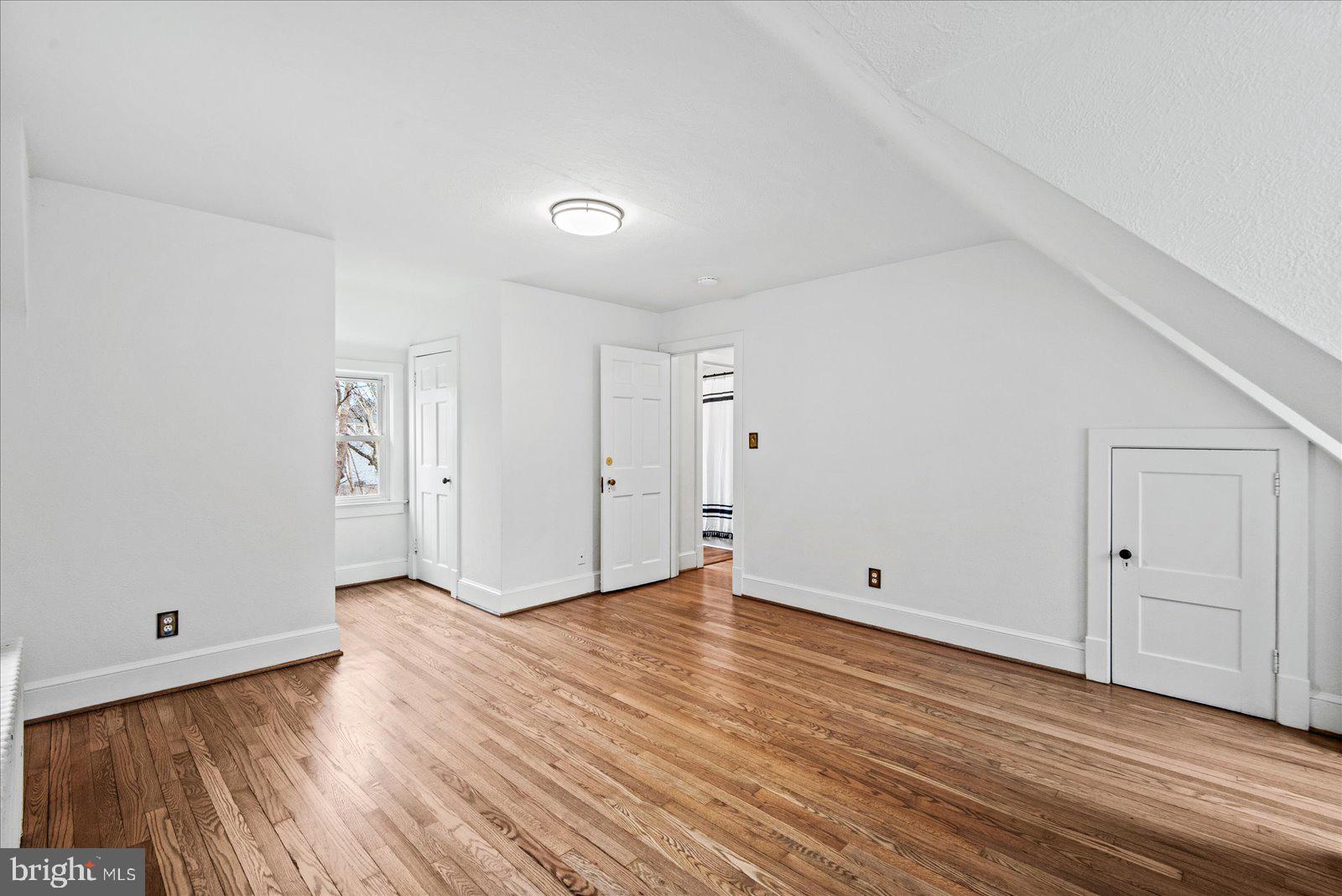 1312 Rowe Street Fredericksburg, VA 22401 - Photo 23 of 45 a view of an empty room with wooden floor