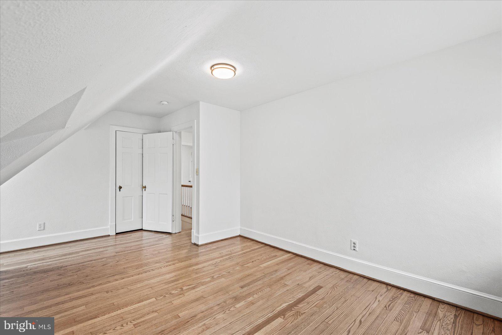 1312 Rowe Street Fredericksburg, VA 22401 - Photo 29 of 45 a view of an empty room with wooden floor