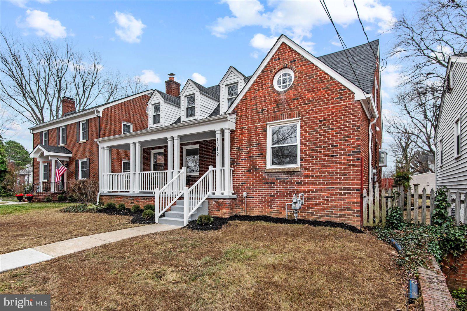 1312 Rowe Street Fredericksburg, VA 22401 - Photo 4 of 45 a front view of a house with a yard
