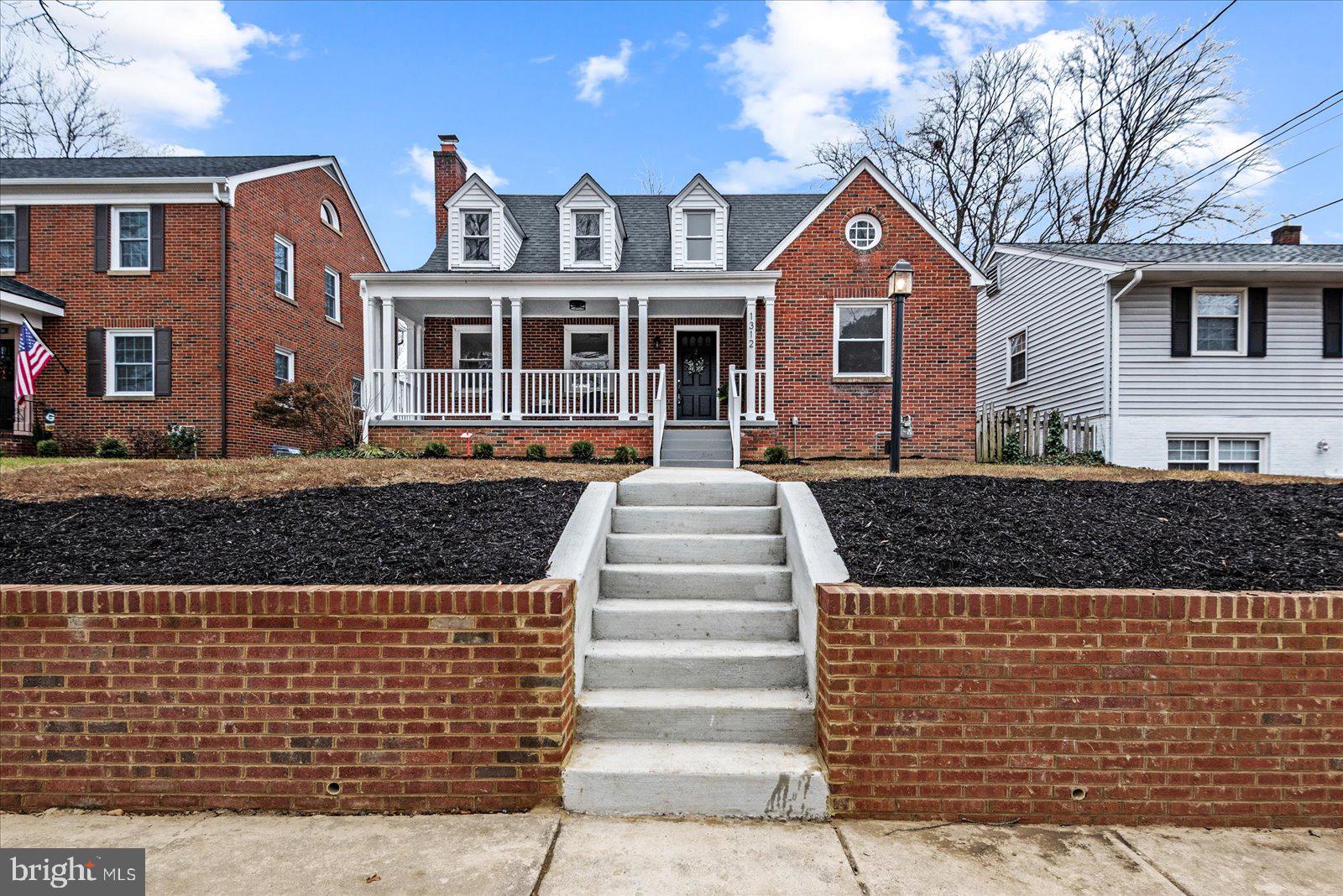 1312 Rowe Street Fredericksburg, VA 22401 - Photo 5 of 45 a front view of a house with a yard