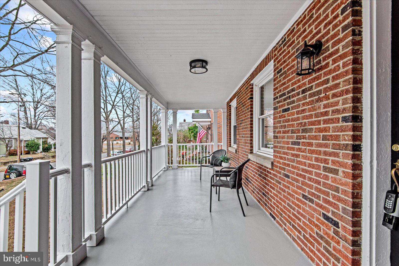 1312 Rowe Street Fredericksburg, VA 22401 - Photo 6 of 45 a view of a porch with furniture and a gate