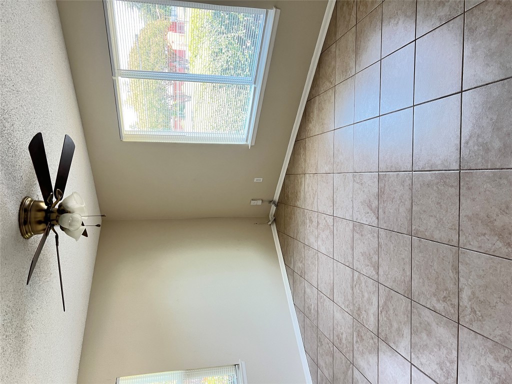3112 Govalle Avenue, Unit B Austin, TX 78702 - Photo 5 of 7 a view of an empty room with a window