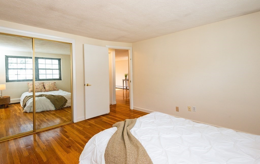 82 Renwick Road, Unit A Wakefield, MA 01880 - Photo 22 of 34 a bedroom with a bed and a window