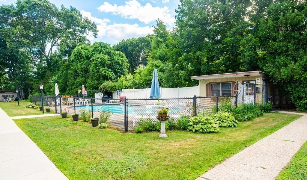 82 Renwick Road, Unit A Wakefield, MA 01880 - Photo 32 of 34 a view of house with a backyard