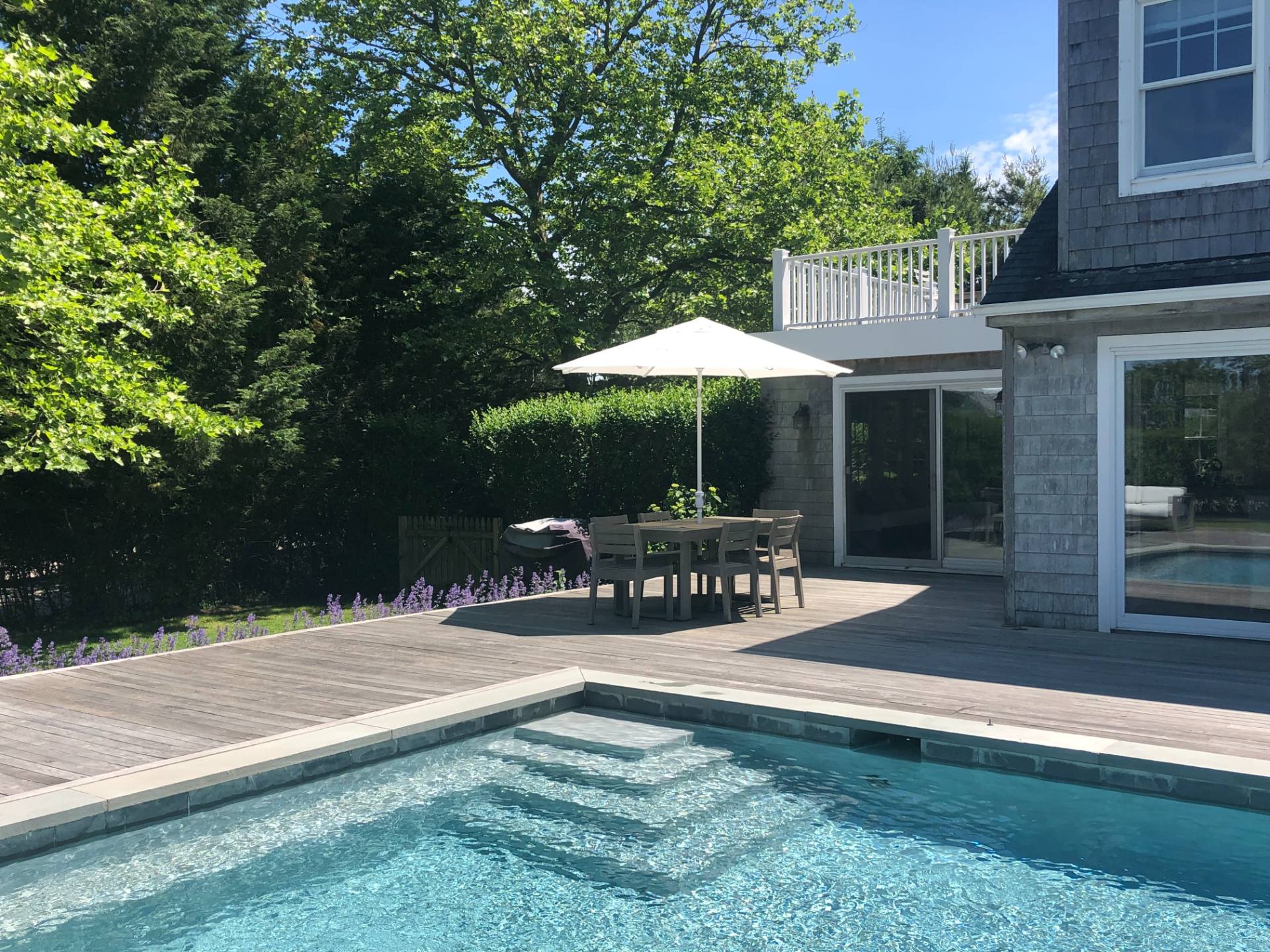 761 North Sea Mecox Road Southampton, NY 11968 - Photo 3 of 22 a view of outdoor space yard deck patio and outdoor kitchen