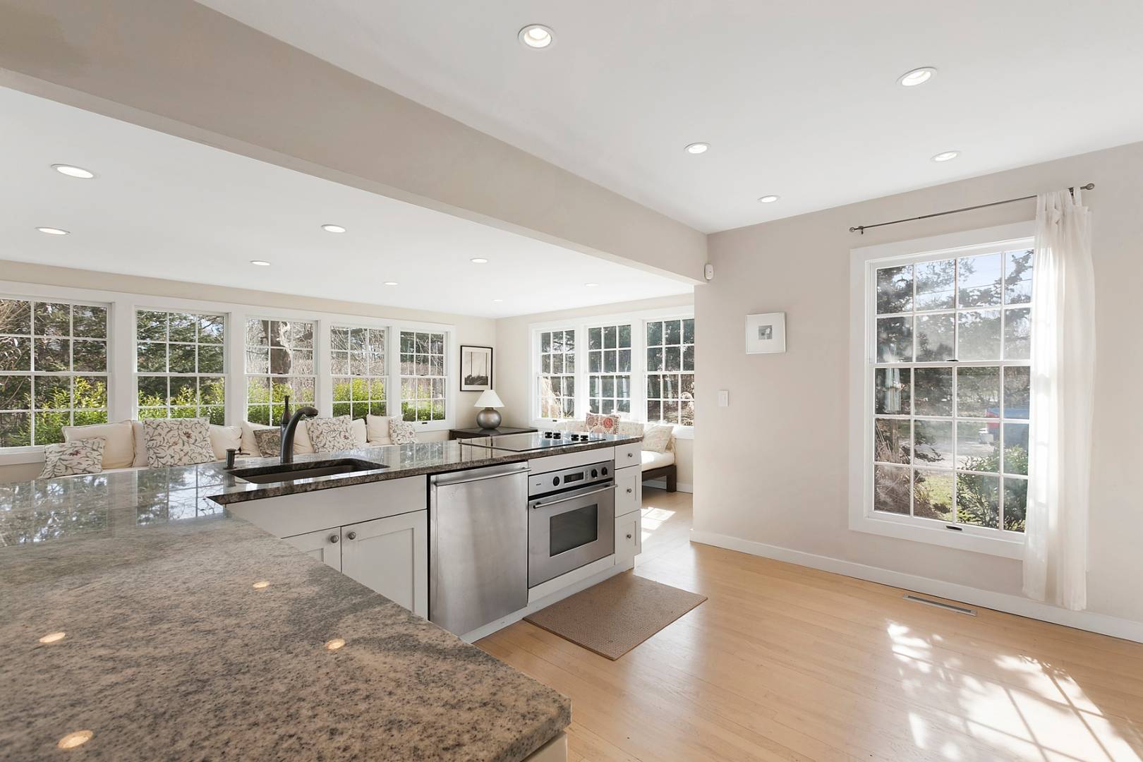 761 North Sea Mecox Road Southampton, NY 11968 - Photo 7 of 22 a kitchen with stainless steel appliances granite countertop a stove and a sink