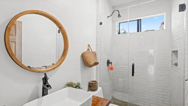 a bathroom with a sink and a mirror