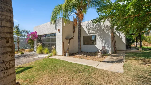 a view of a chairs and table in the terrace