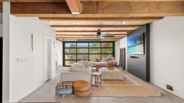 a living room with a couch and a table