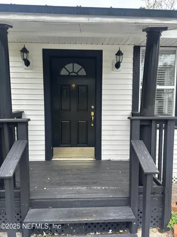 a front view of a house with parking