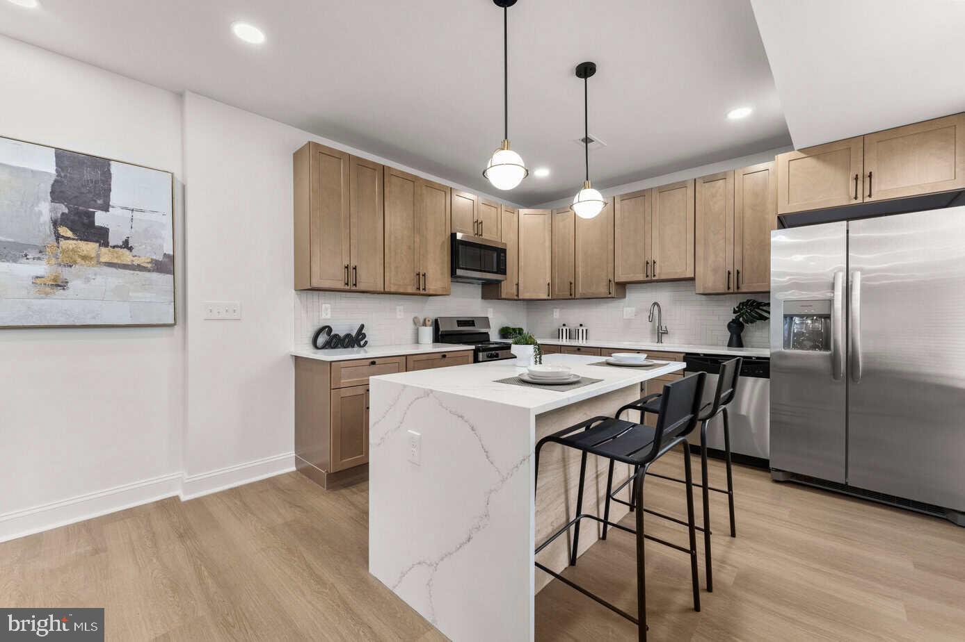 3121 McElderry Street Baltimore, MD 21205 - Photo 9 of 25 Kitchen w/ Stainless Appliances