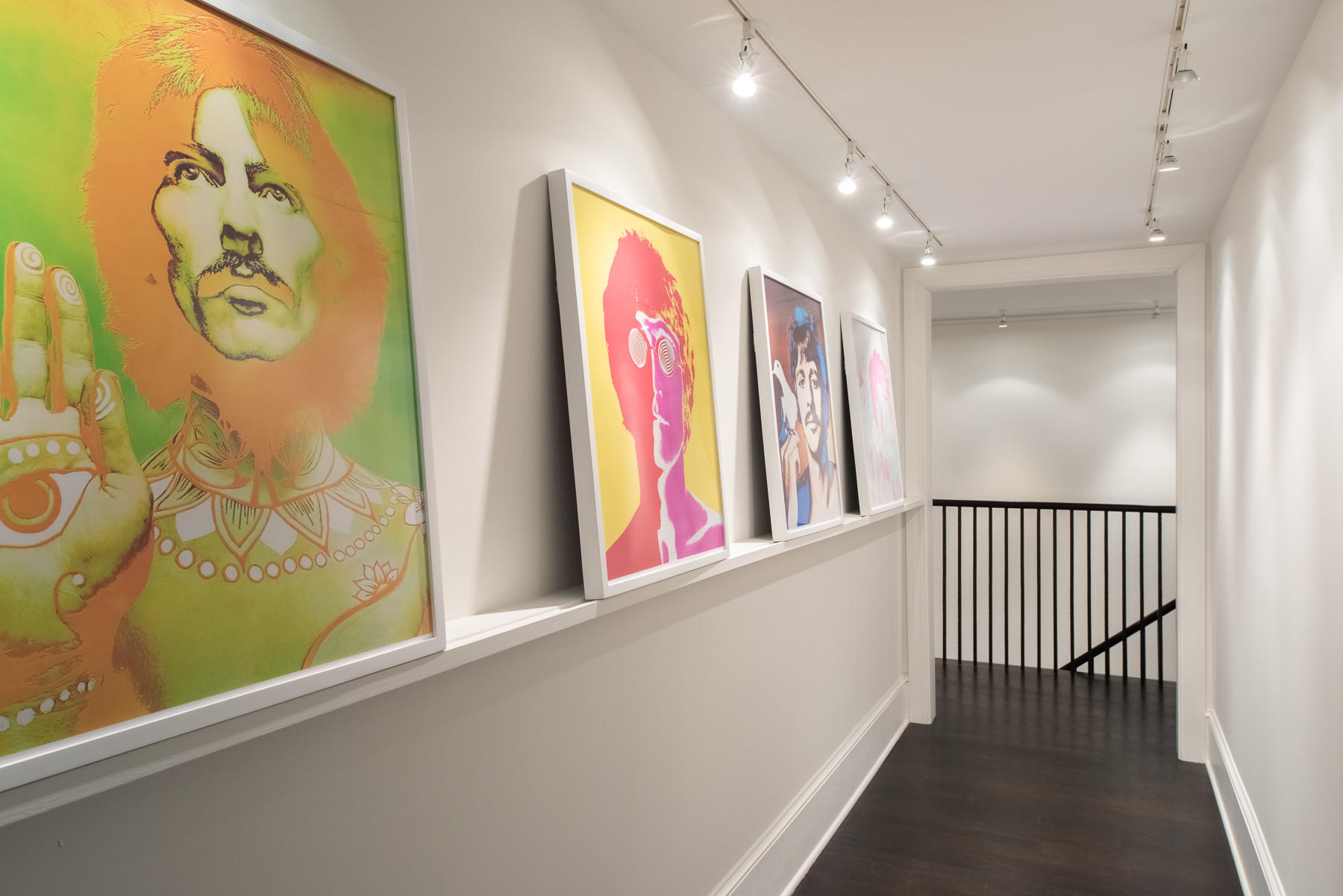 20 St Nicholas Road Darien, CT 06820 - Photo 27 of 38 a view of a hallway with furniture and paintings on the wall
