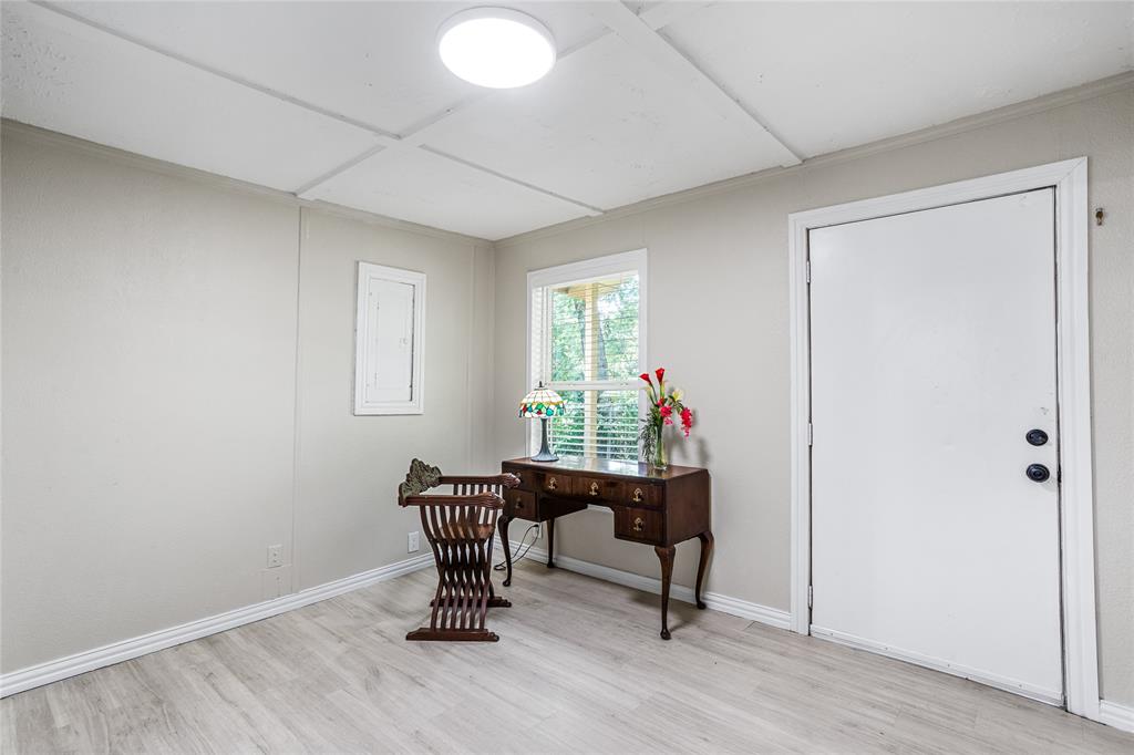 614 Rice Street Denison, TX 75020 - Photo 18 of 22 Nice office space in the same room as the laundry - great location that takes you out to the back yard. There could be other uses for this area, but it is nice to have this space.