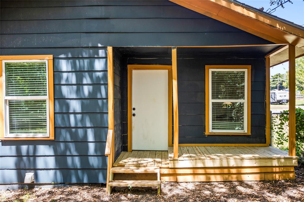 614 Rice Street Denison, TX 75020 - Photo 21 of 22 The back porch area was rebuilt for safety.