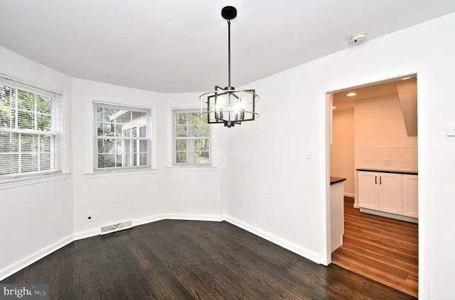 a kitchen with a sink and a window