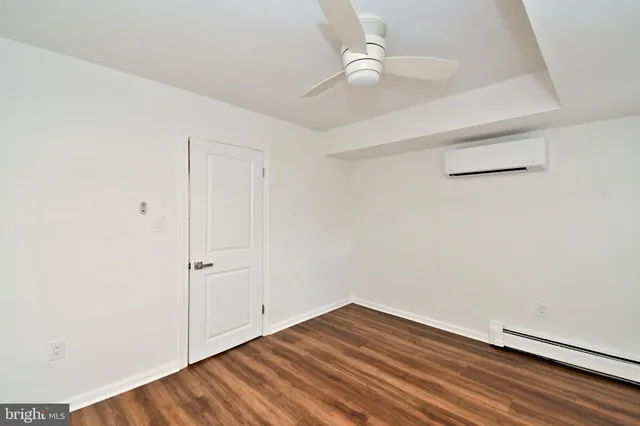 a view of bathroom with a toilet sink and a window