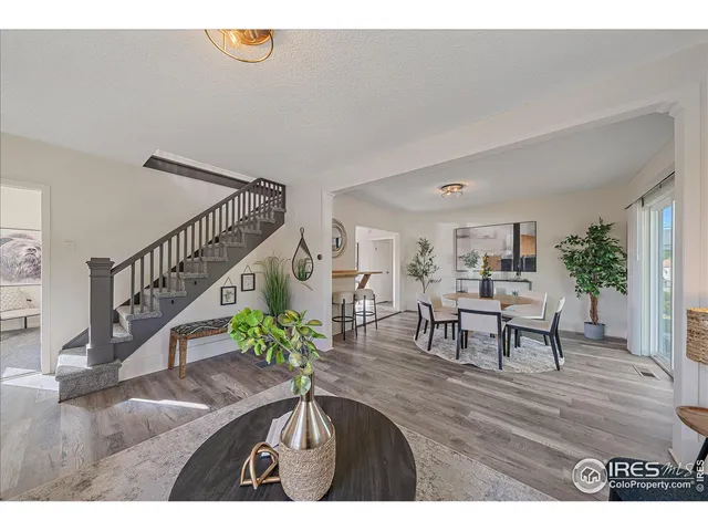 a view of entryway livingroom and hall