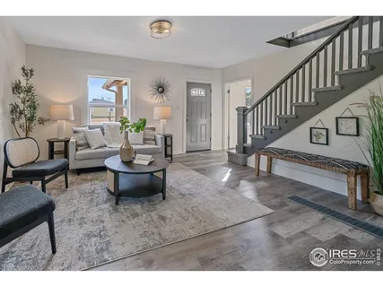 a living room with furniture and a table