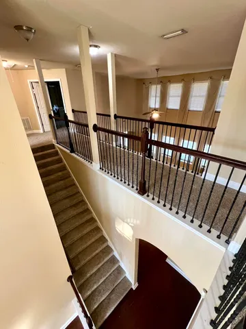 a view of a hallway view with dining room