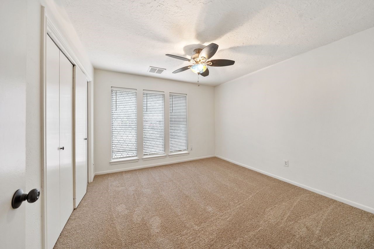 8 Flint Street Conroe, TX 77301 - Photo 15 of 21 Second Bedroom