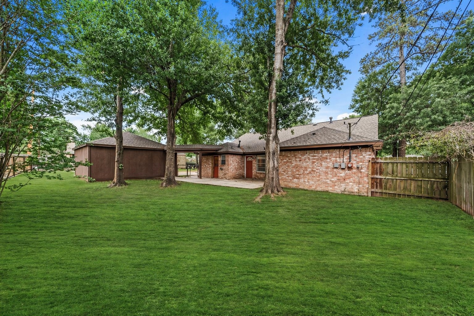 8 Flint Street Conroe, TX 77301 - Photo 19 of 21 Backyard