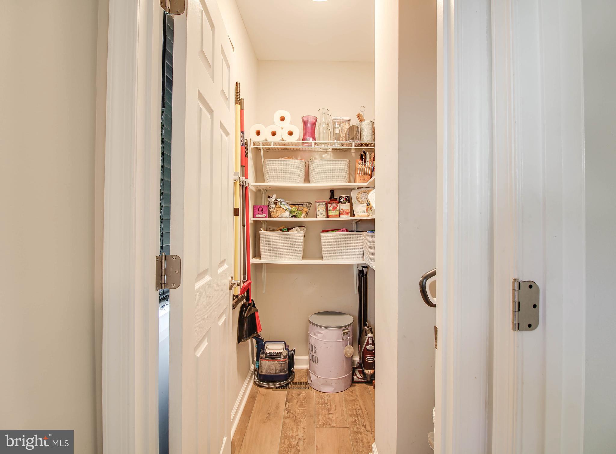 7805 Outing Avenue Pasadena, MD 21122 - Photo 11 of 51 a room with storage and utility