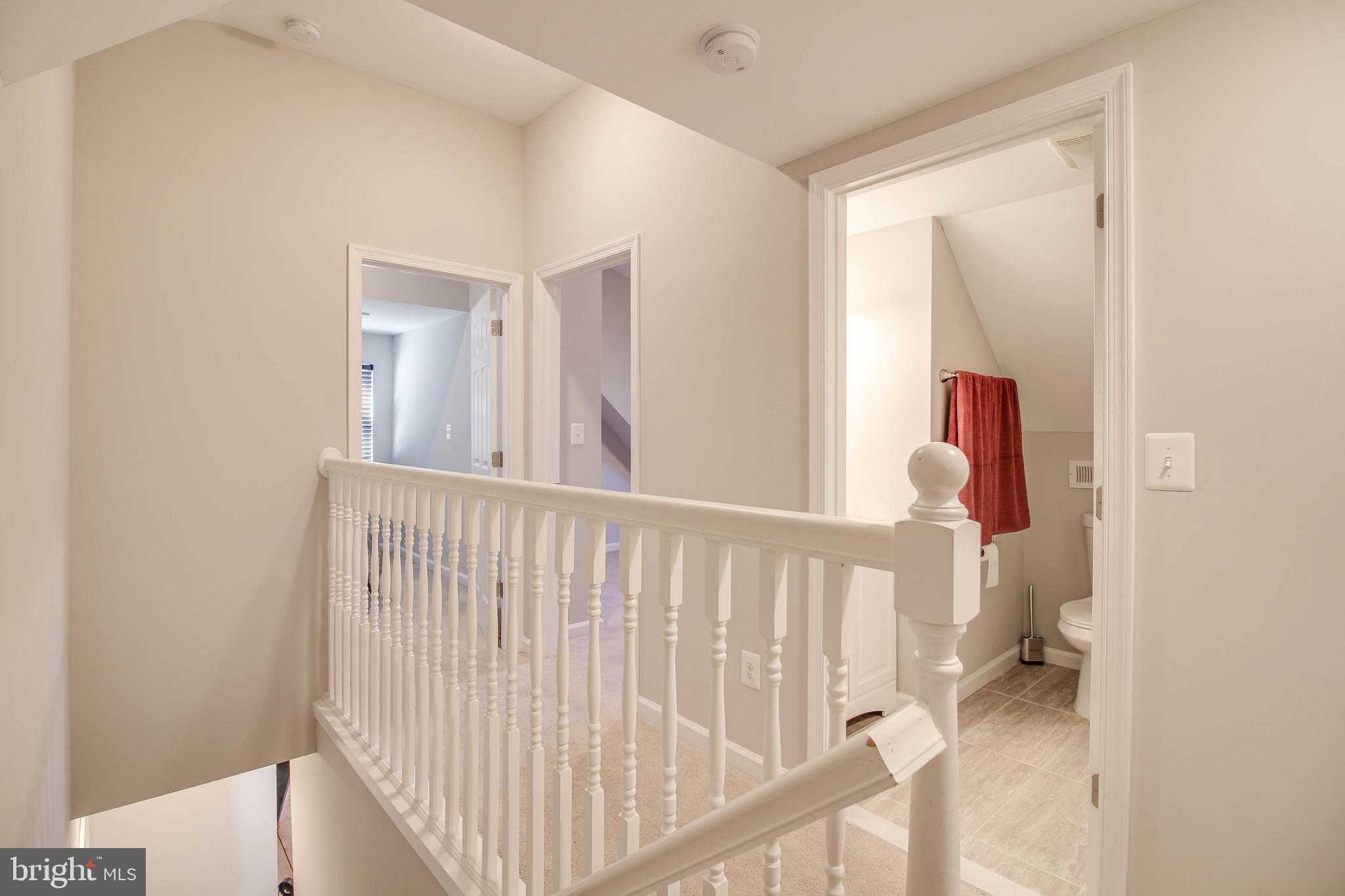 7805 Outing Avenue Pasadena, MD 21122 - Photo 17 of 51 a view of a hallway