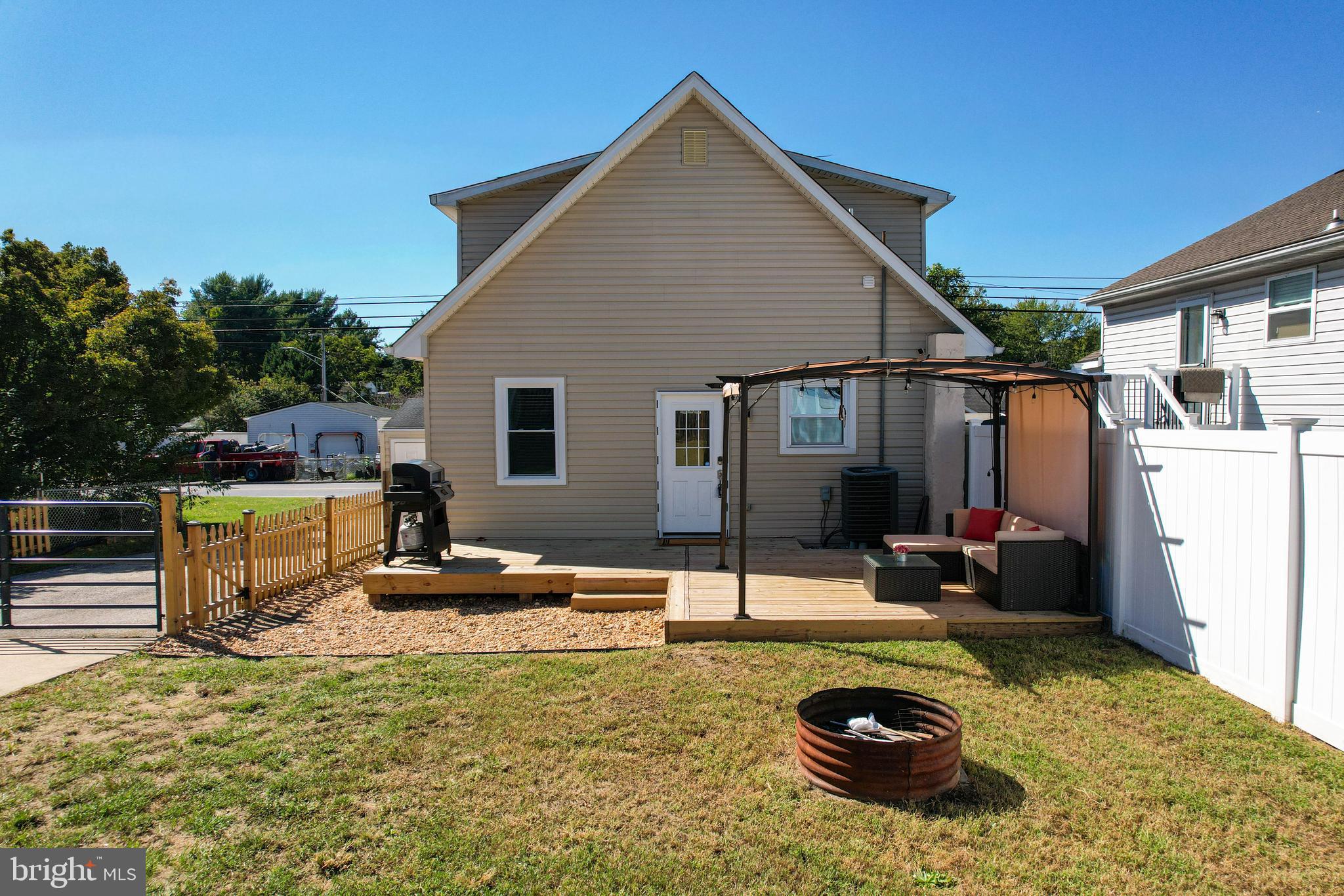 7805 Outing Avenue Pasadena, MD 21122 - Photo 35 of 51 a backyard of a house with seating space