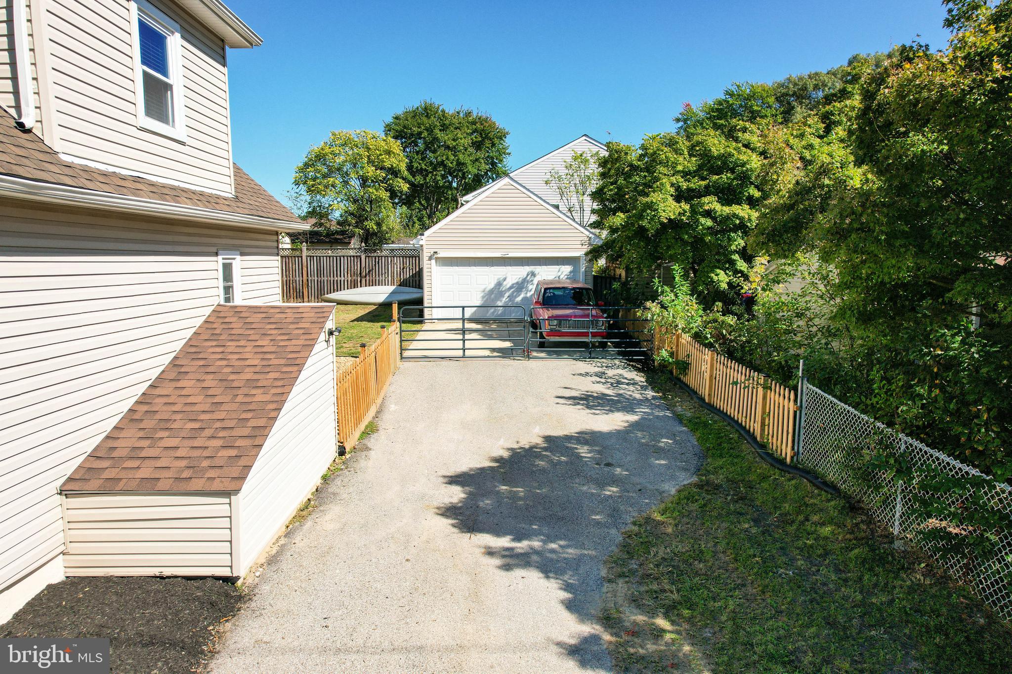 7805 Outing Avenue Pasadena, MD 21122 - Photo 40 of 51 a view of a backyard with sitting area
