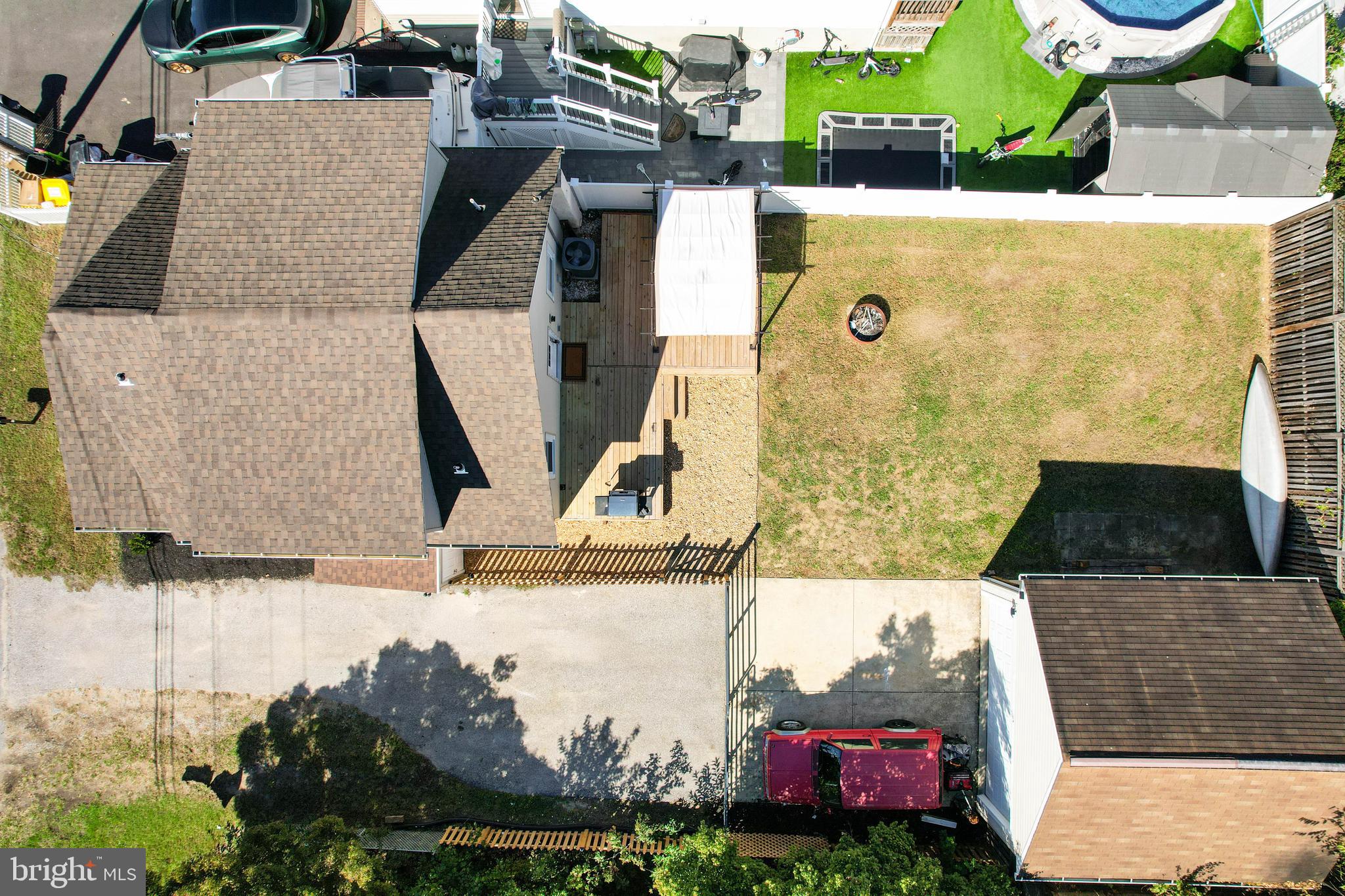 7805 Outing Avenue Pasadena, MD 21122 - Photo 42 of 51 an aerial view of a house with swimming pool and large trees