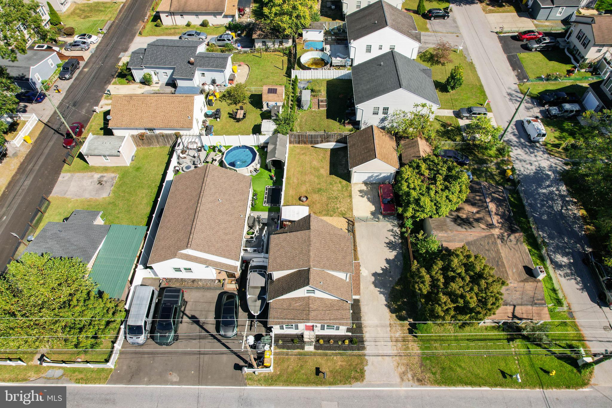 7805 Outing Avenue Pasadena, MD 21122 - Photo 43 of 51 an aerial view of multiple houses with yard