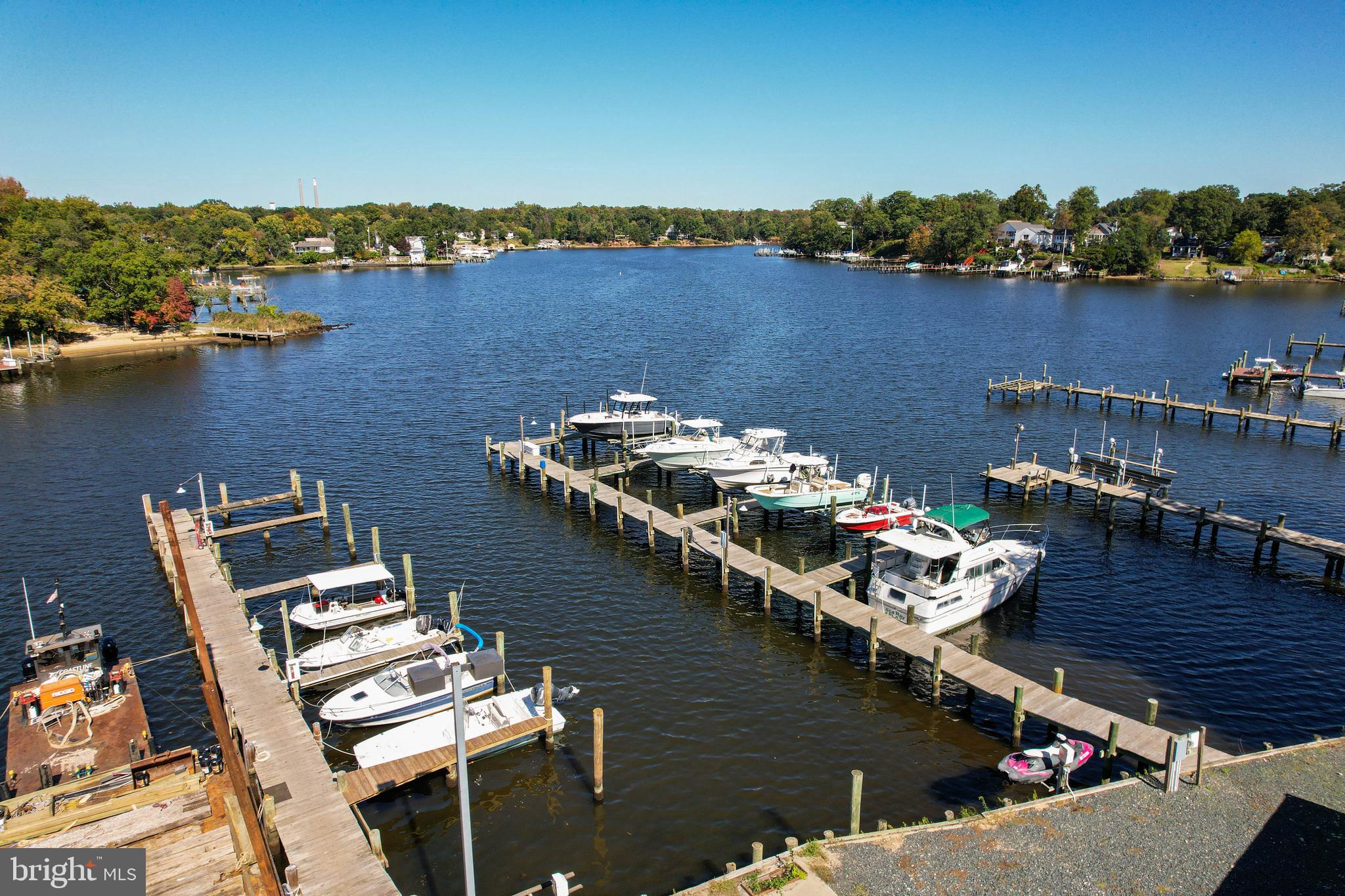 7805 Outing Avenue Pasadena, MD 21122 - Photo 44 of 51 an aerial view of a house with lake view