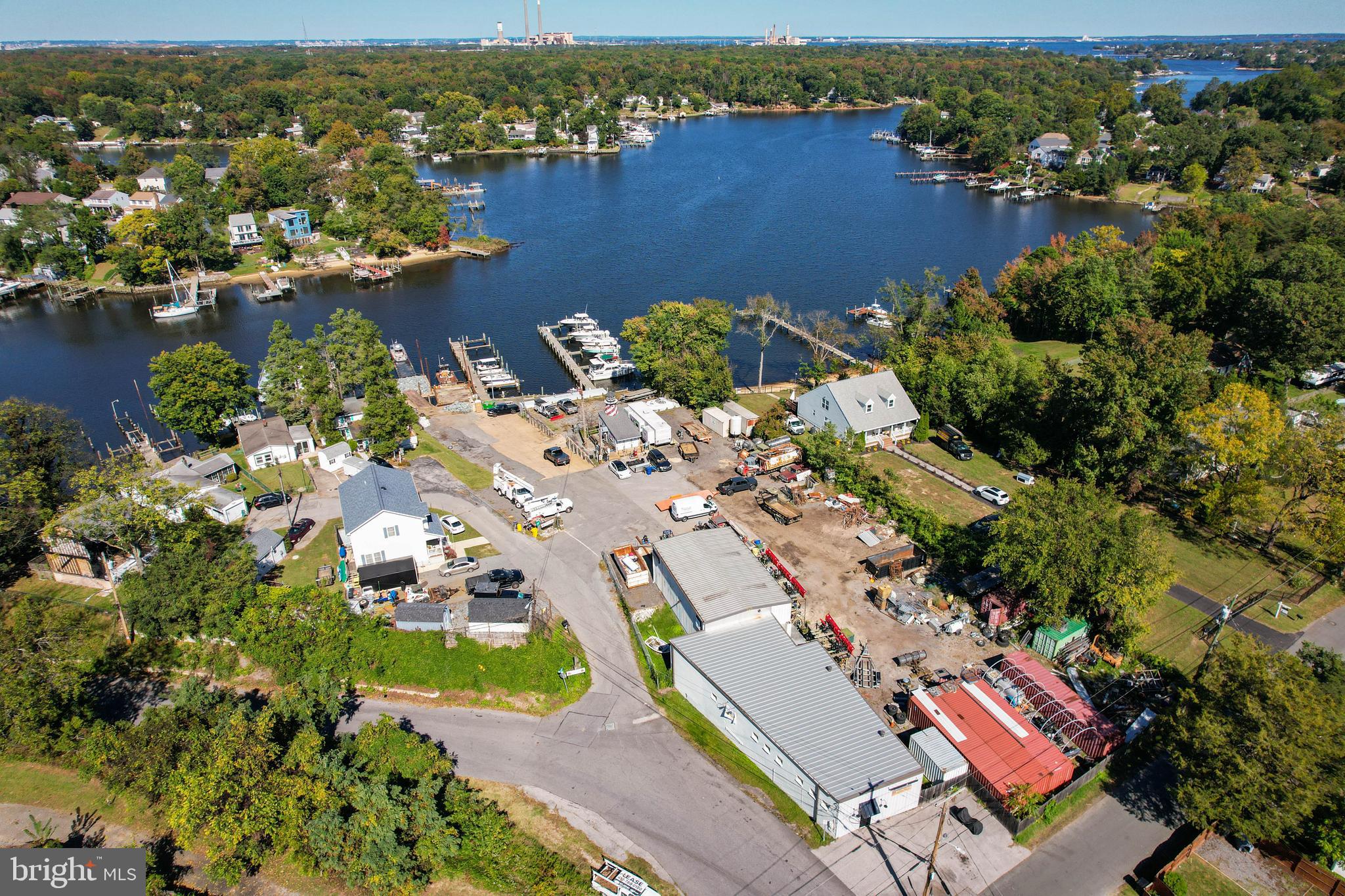 7805 Outing Avenue Pasadena, MD 21122 - Photo 45 of 51 an aerial view of residential houses with outdoor space and lake view