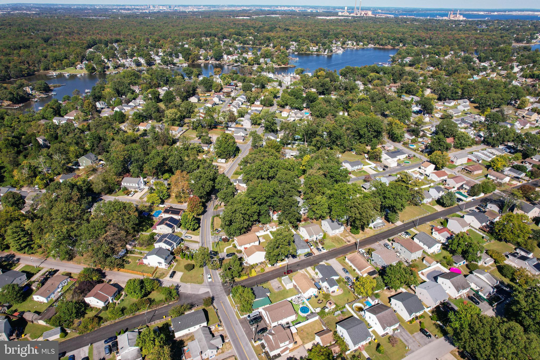 7805 Outing Avenue Pasadena, MD 21122 - Photo 46 of 51 an aerial view of residential houses with outdoor space and trees