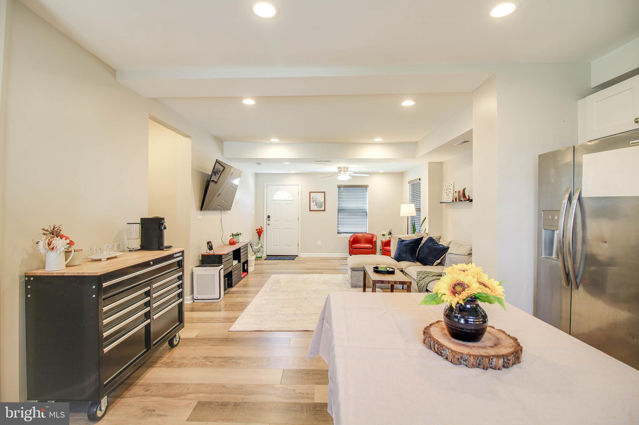 7805 Outing Avenue Pasadena, MD 21122 - Photo 5 of 51 a very nice looking room with a large window