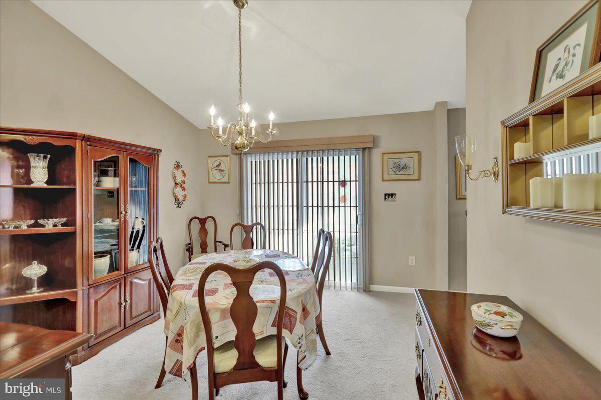 28 Sagebrook Drive Reading, PA 19606 - Photo 14 of 27 a view of a dining room with furniture and chandelier
