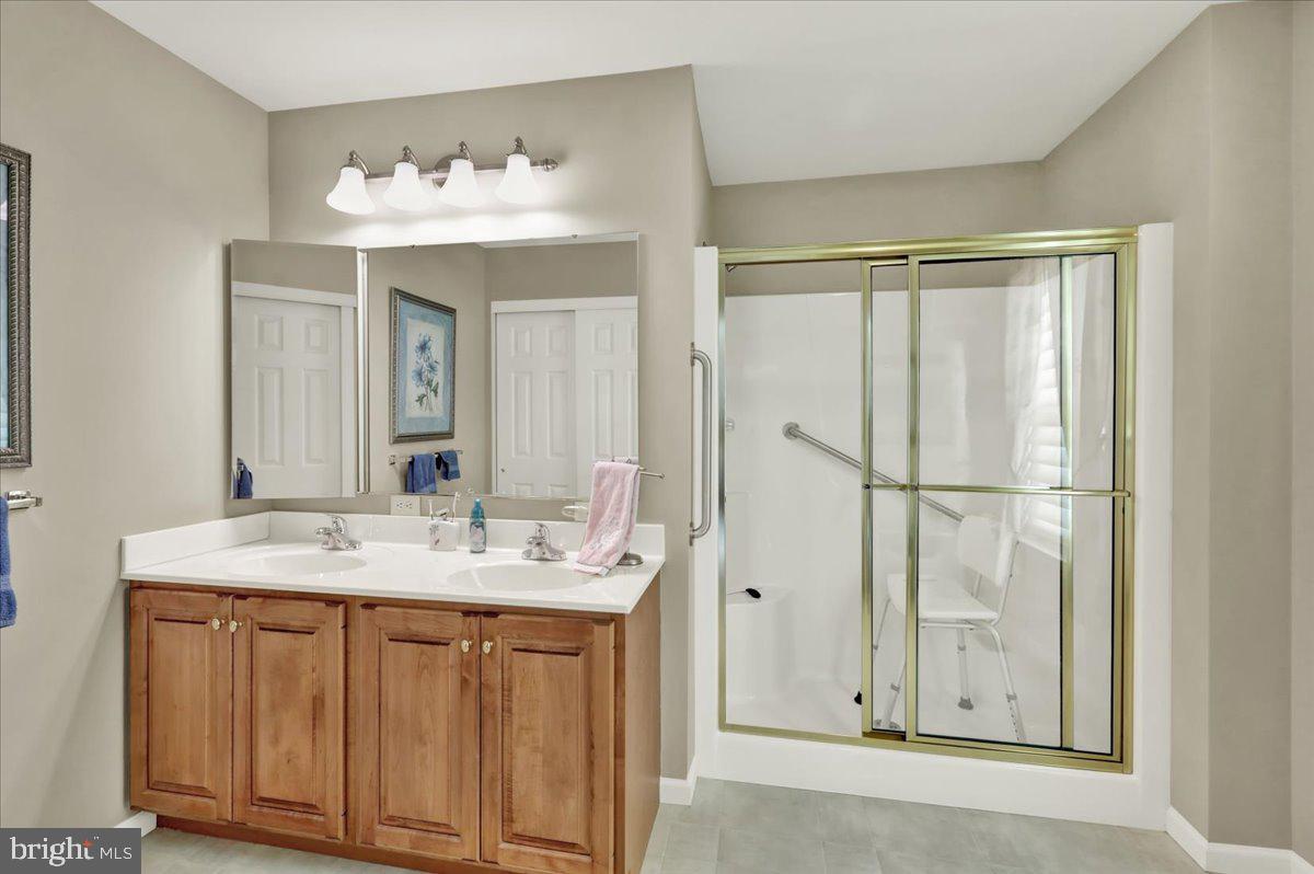 28 Sagebrook Drive Reading, PA 19606 - Photo 19 of 27 a bathroom with a sink vanity and a mirror
