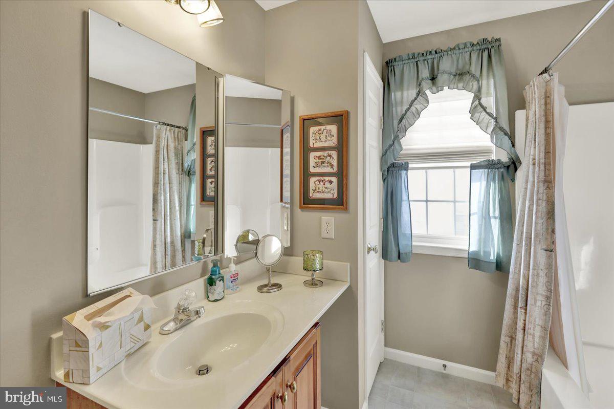 28 Sagebrook Drive Reading, PA 19606 - Photo 20 of 27 a en suite bathroom with a sink shower and a mirror