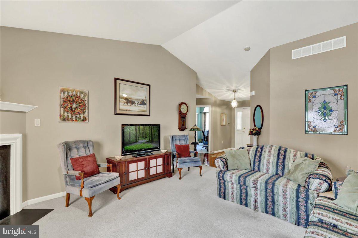 28 Sagebrook Drive Reading, PA 19606 - Photo 8 of 27 a living room with furniture and a flat screen tv